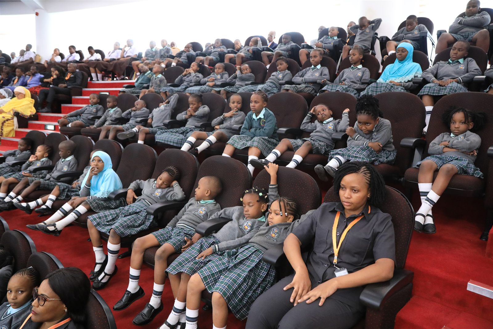 Braggin Pre and Primary School staff and pupils group photo at the National Assembly, Dodoma